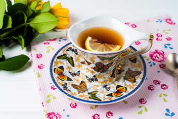 cups of tea with mint on wooden table
