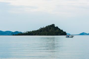 Floating fishing boat in the sea