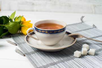 cups of tea with mint on wooden table