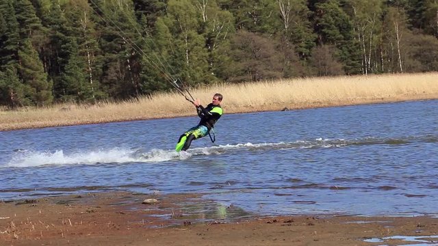 The kite surfer landing in the spring of Scandinavia