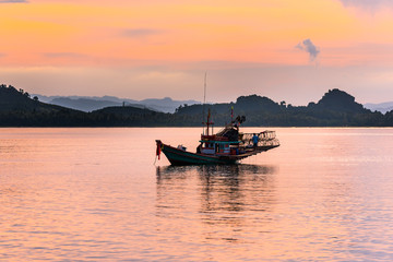 Floating fishing boat in the sea © sittitap