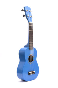 Blue ukuleles isolated on white