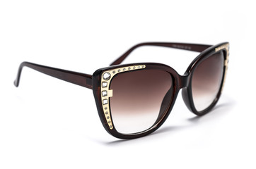 women's sunglasses with brown glass isolated on white