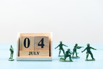 wood calendar for 4 july and soldier toys