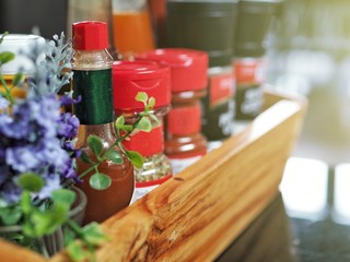 Red tabasco in wooden box.
