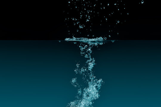 Splashing water with oxigen bubbles. Underwater background