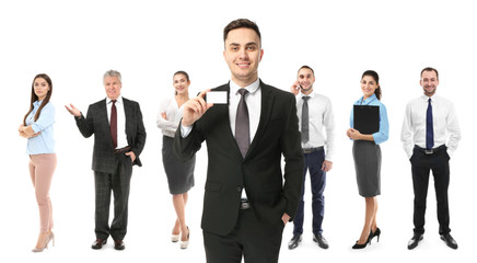 Young man holding blank business card and group of people on white background