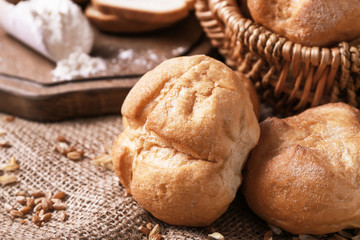 Delicious loaves on sackcloth, closeup