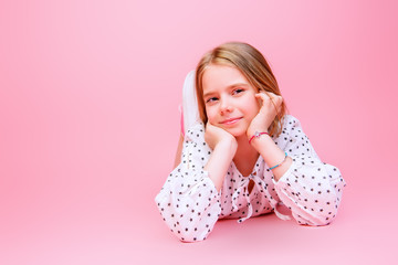 pretty child over pink