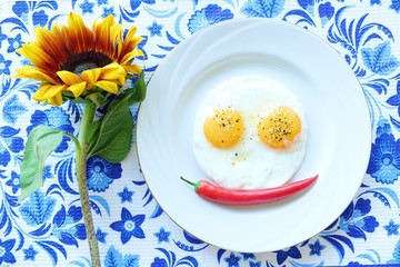 Funny eggs with red chile pepper 