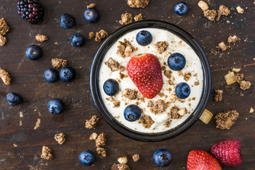 Serving of Fresh White Yogurt with Raspberry, Blueberries and Muesli