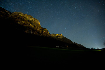 Mountain and houses at night in Austria