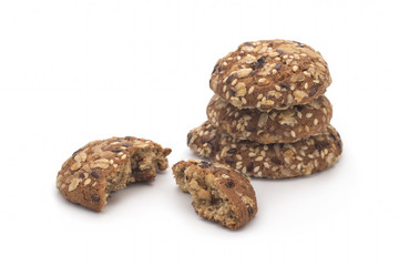 Broken oatmeal cookies on a white background