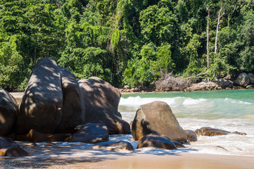 Rocky beach in the Thai jungle