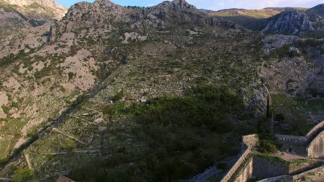 The Old Town of Kotor. The wall around the city on the mountain. With the aid of aerial photography drone. Montenegro