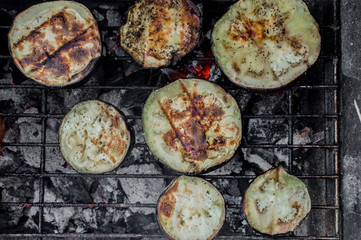 Preparing an eggplant on a grill