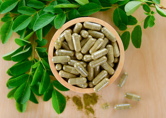 Moringa leaves and capsules (Herbs for health)