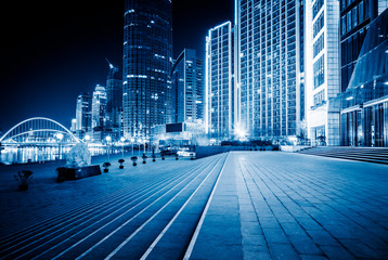 Obraz premium modern business building in financial district with empty square/pavement/space