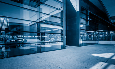 modern business building in financial district with empty square/pavement/space