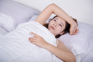 Fototapeta na wymiar woman sleepless on bed