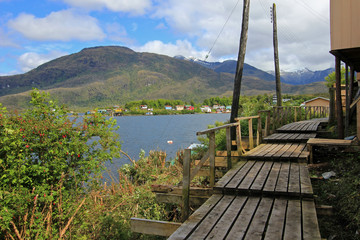Boardwalk at the isolated Puerto Eden in Wellington Islands, fiords of southern Chile, Province...