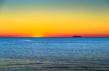 Island Afloat on the Sound at Sunset