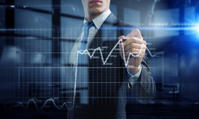 Businessman in dark office