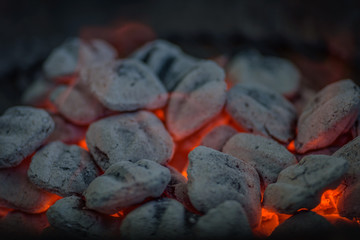 hot charcoals on the grill ready to barbecue