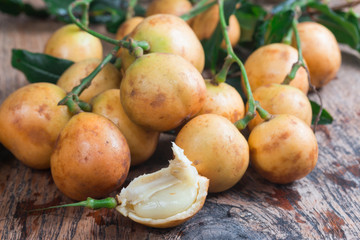 Rambeh fruit isolate on wooden table background
