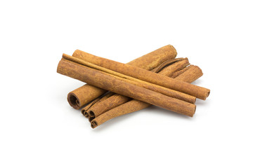 Stack of cinnamon isolated on white