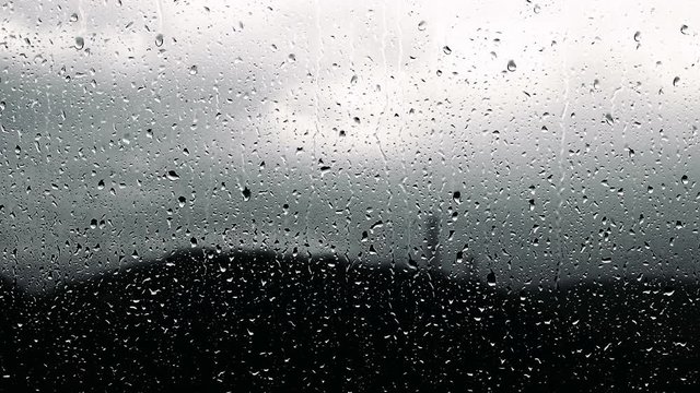 Rain drops on a glass surface