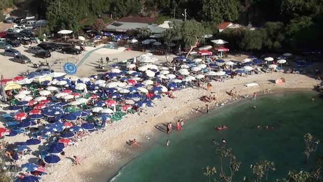 BUYUK CAKIL BEACH, KAS, TURKEY &ndash; August 20, 2013: Beach in bay, high season, top view, audio