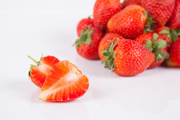 Strawberries berry close up on white background