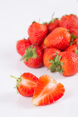 Strawberries berry close up on white background