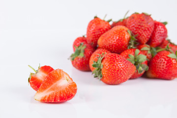 Strawberries berry close up on white background