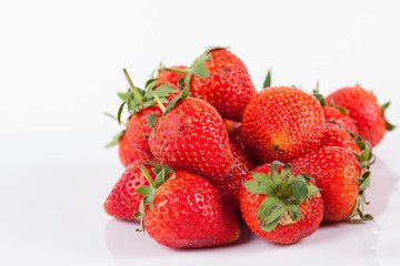 Strawberries berry close up on white background