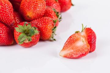 Strawberries berry close up on white background