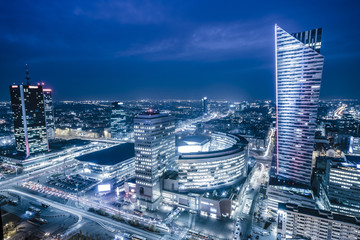 Obraz na płótnie Canvas Warsaw,Poland October 2016:Warsaw city with skyscrapers at night