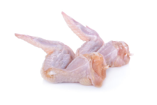 raw chicken wings on white background