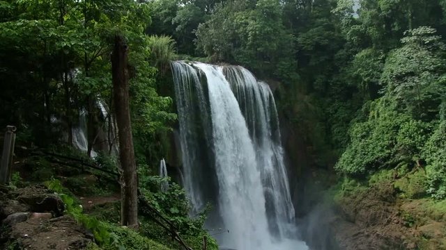 Tilt up of powerful Pulhapanzak waterfall in Honduras