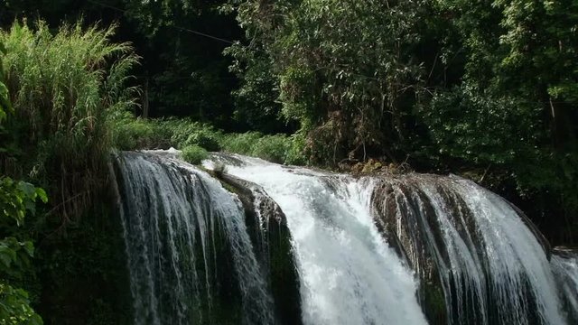 Close shot of water on the top of Pulhapanzak waterfall in Honduras