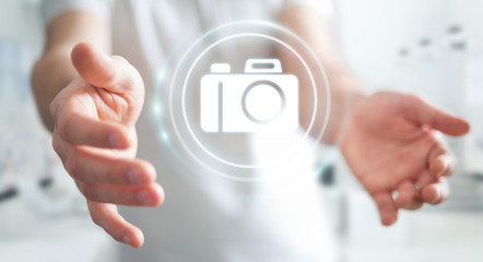 Businessman using modern camera application 3D rendering