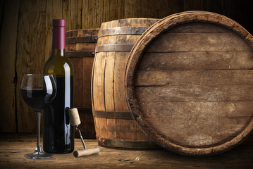 Closeup of red wine pouring in glass