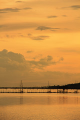 Fototapeta na wymiar View of Songkhla lake which has fish cage in water at sunset ; Koh Yor, Sonkhla province, Thailand 