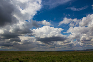 Fototapeta na wymiar Amazing clouds and sky. Steppe in spring, Kazakhstan