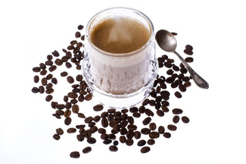 Coffee with milk in glass cup on white background