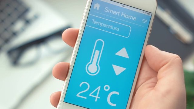 Changing temperature on smart home app on the smartphone