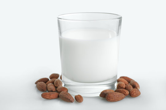 Glass of milk and almonds