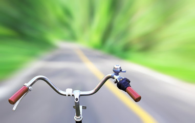 Fototapeta na wymiar Vintage bicycle hand brake on new road motion blur.