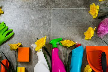 Cleaning products on stone background with copyspace